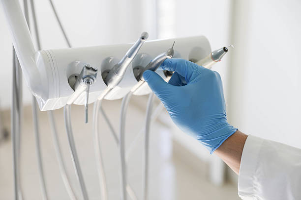 Professional Wisdom Tooth Removal technician working in DeLand Southwest, FL